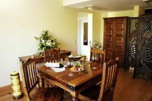 1 person executive suite with pool view, balcony, and breakfast
